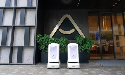 智慧旅居新体验 普渡机器人与亚朵集团携手开启楼宇智能化酒店服务新纪元